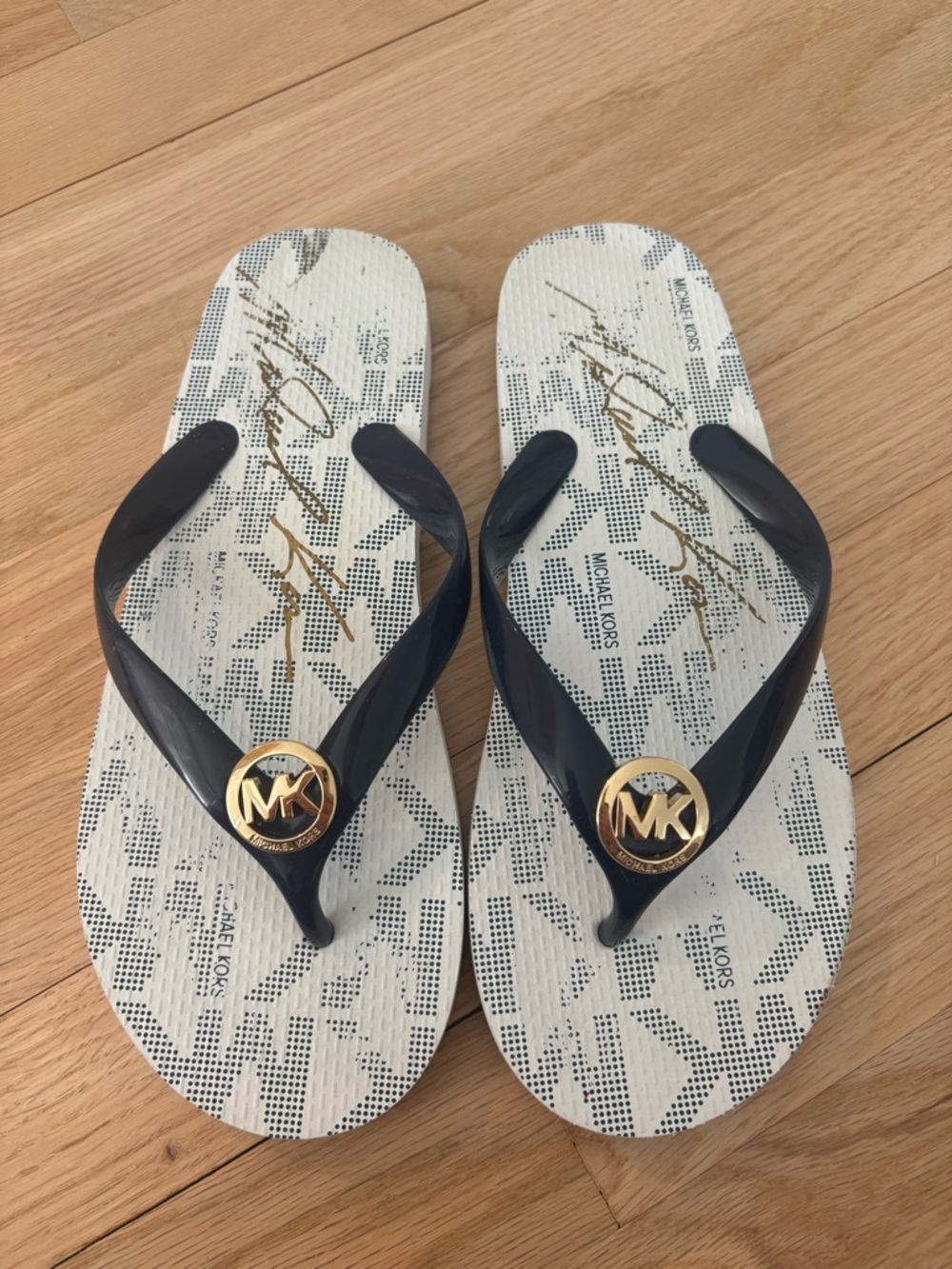 Michael Kors Navy & White Logo Flip Flops with Gold MK Emblems
